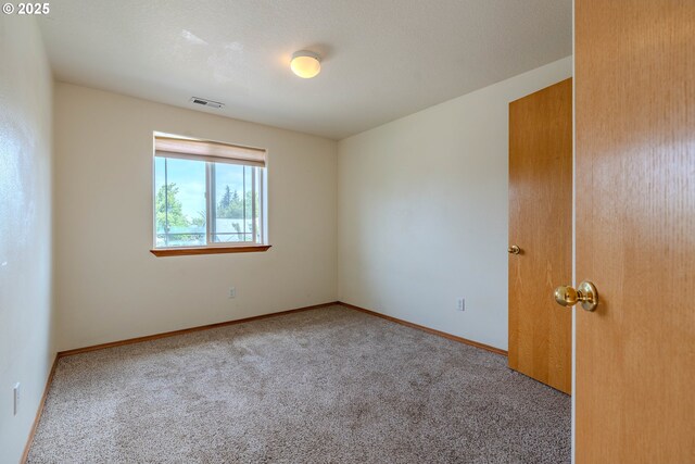 428 SE 11th Cir, Troutdale, OR 97060 - carpeted spare room featuring baseboards