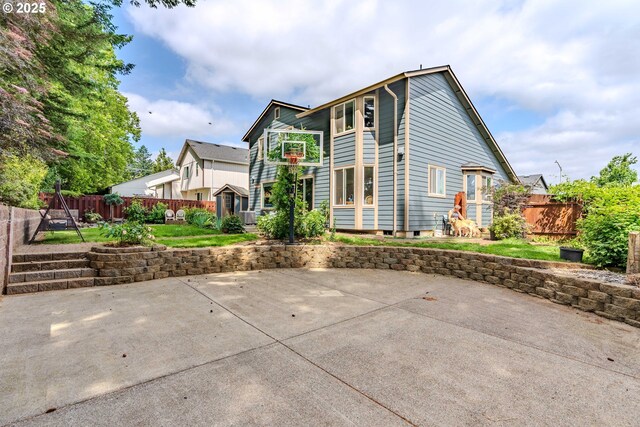 428 SE 11th Cir, Troutdale, OR 97060 - rear view of property featuring a fenced backyard and a patio area