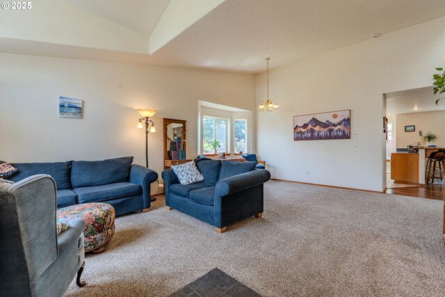 428 SE 11th Cir, Troutdale, OR 97060 - carpeted living room with a chandelier and high vaulted ceiling