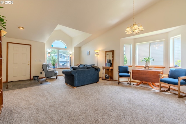 428 SE 11th Cir, Troutdale, OR 97060 - carpeted living room with a chandelier and high vaulted ceiling