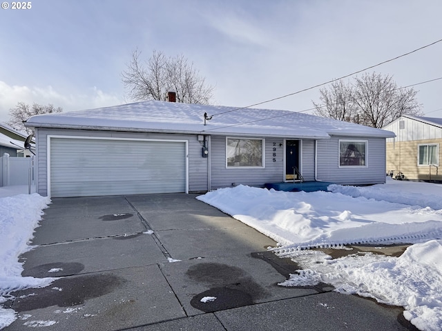 single story home featuring a garage