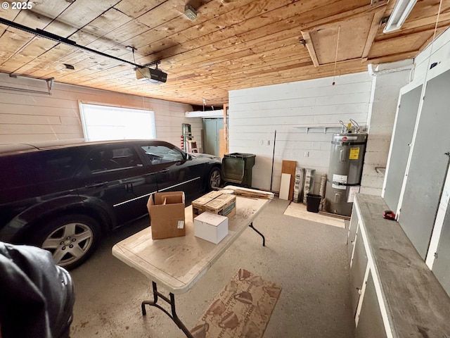 garage with wood ceiling, strapped water heater, and a garage door opener