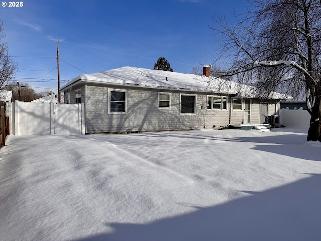 view of snow covered property