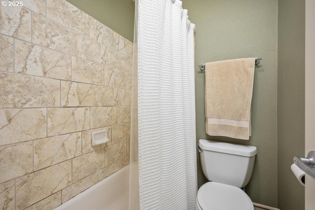 6600 SE Division St Unit 304, Portland, OR 97206 - bathroom featuring shower / bathtub combination with curtain and toilet