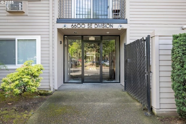 6600 SE Division St Unit 304, Portland, OR 97206 - view of exterior entry featuring a balcony