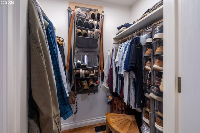 5 Woodthrush Ln, Gleneden Beach, OR 97388 - walk in closet featuring wood finished floors