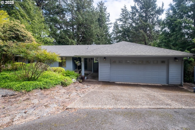 5 Woodthrush Ln, Gleneden Beach, OR 97388 - single story home featuring an attached garage, a shingled roof, and concrete driveway