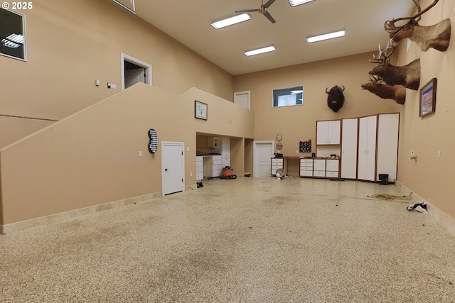 garage featuring baseboards