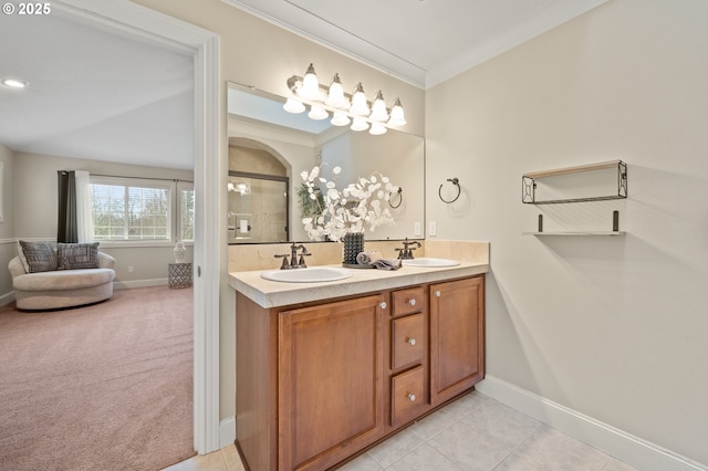 12647 SW 21st Ct, Lake Oswego, OR 97035 - full bathroom featuring double vanity, crown molding, a shower, and tile patterned flooring