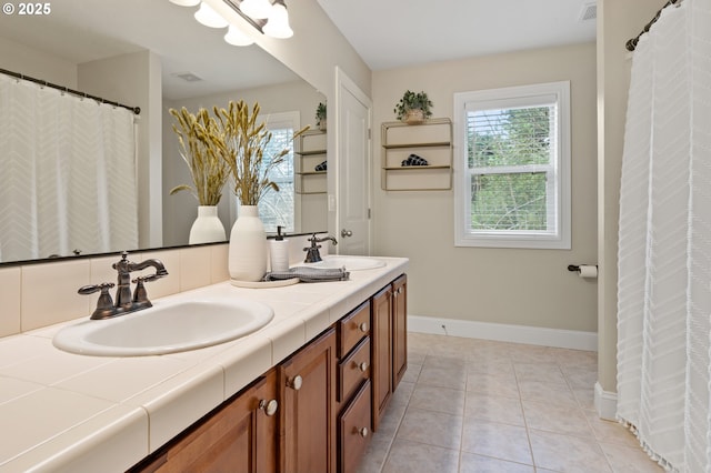 12647 SW 21st Ct, Lake Oswego, OR 97035 - bathroom with double vanity and tile patterned flooring