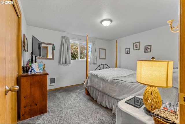 carpeted bedroom featuring baseboards