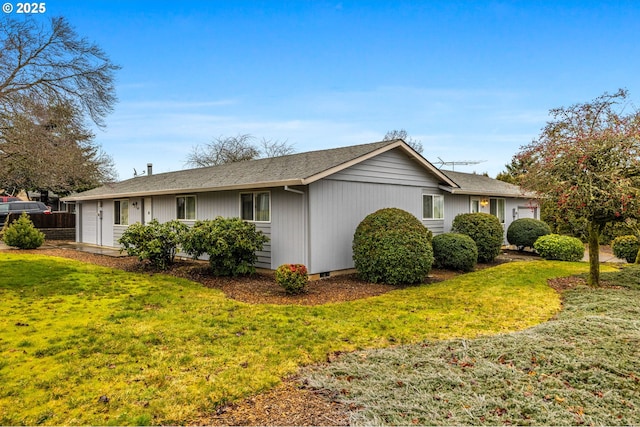 view of home's exterior featuring a garage, crawl space, a lawn, and roof with shingles