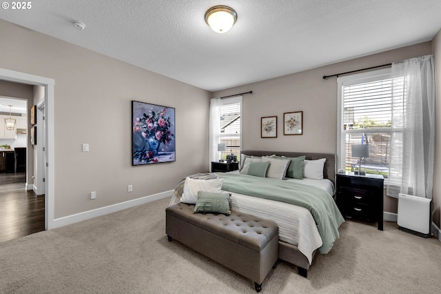 2625 NE 8th Ave, Battle Ground, WA 98604 - carpeted bedroom featuring baseboards and a textured ceiling