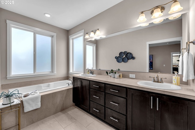 2625 NE 8th Ave, Battle Ground, WA 98604 - bathroom featuring double vanity, tile patterned flooring, and a garden tub