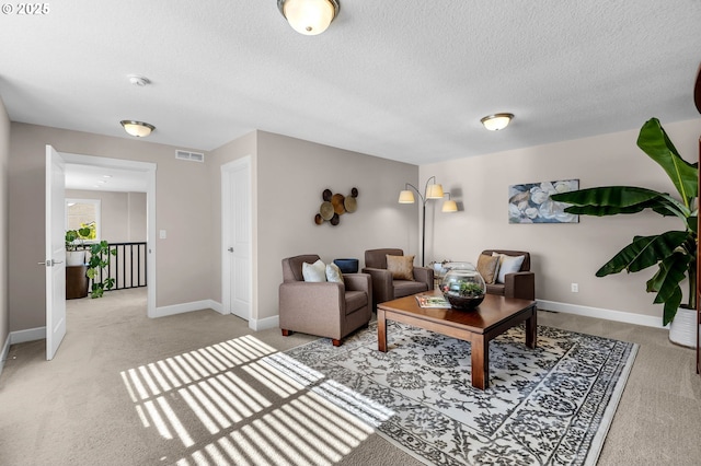 2625 NE 8th Ave, Battle Ground, WA 98604 - living room featuring light carpet, a textured ceiling, and baseboards