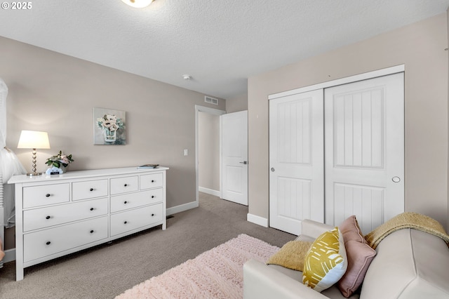 2625 NE 8th Ave, Battle Ground, WA 98604 - sitting room featuring light colored carpet, baseboards, and a textured ceiling