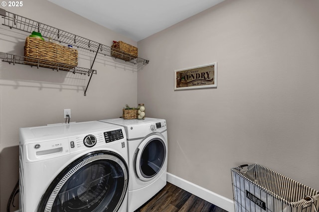 2625 NE 8th Ave, Battle Ground, WA 98604 - laundry room featuring independent washer and dryer, baseboards, and dark wood-style flooring