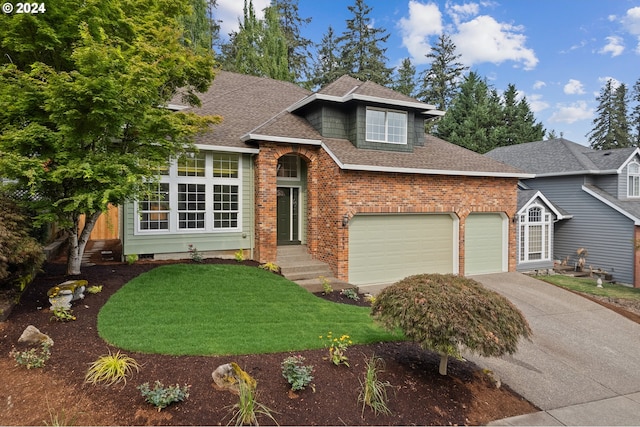 split level home featuring a garage and a front yard