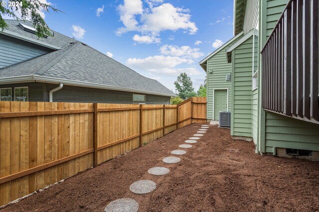 view of yard featuring a wooden deck