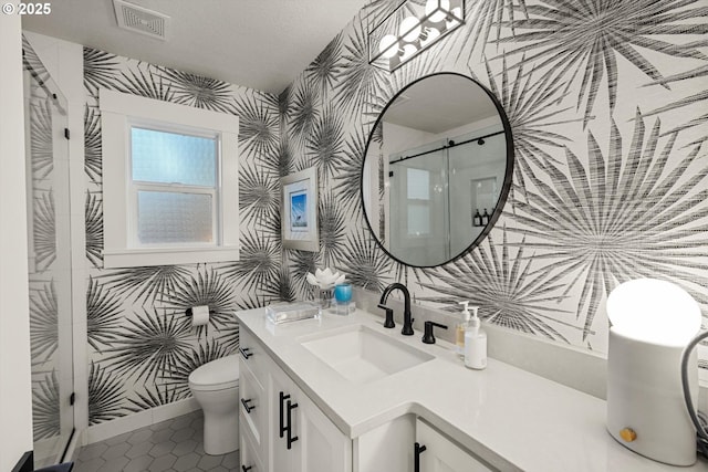 364 Northshore Rd, Lake Oswego, OR 97034 - full bathroom with wallpapered walls, vanity, a shower stall, and tile patterned floors