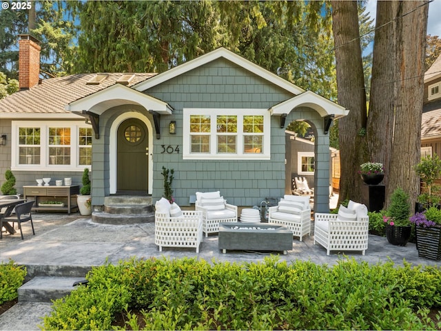 364 Northshore Rd, Lake Oswego, OR 97034 - view of front of property featuring an outdoor living space, a chimney, and a patio area