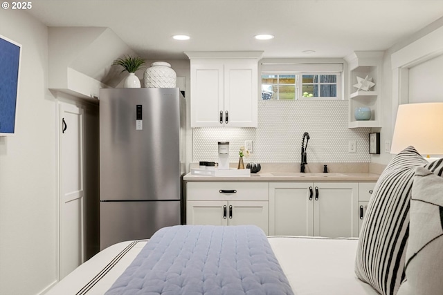 364 Northshore Rd, Lake Oswego, OR 97034 - kitchen featuring freestanding refrigerator, tasteful backsplash, light countertops, white cabinetry, and recessed lighting