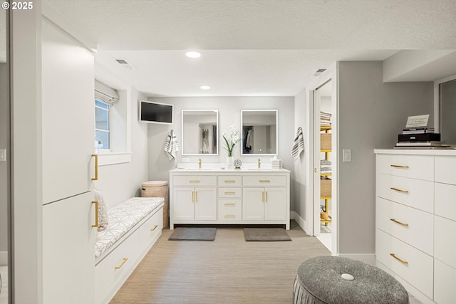 364 Northshore Rd, Lake Oswego, OR 97034 - full bathroom featuring double vanity, wood finished floors, and recessed lighting