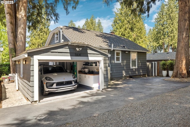 364 Northshore Rd, Lake Oswego, OR 97034 - view of front of home featuring a garage and a shingled roof