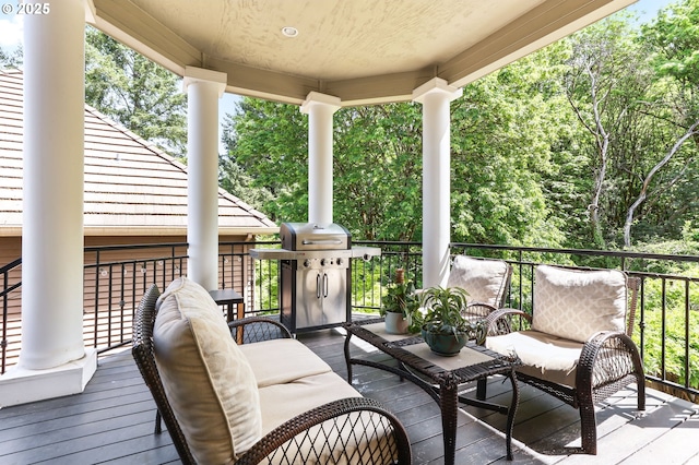 wooden deck with grilling area