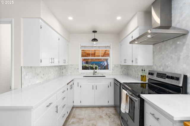 kitchen featuring stainless steel appliances, range hood, and white cabinets