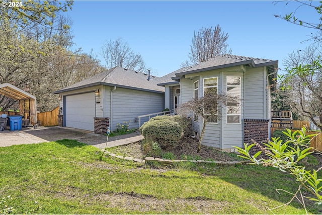 1207 NE 2nd Cir, Battle Ground, WA 98604 - view of front of house featuring a front yard, fence, brick siding, and a garage