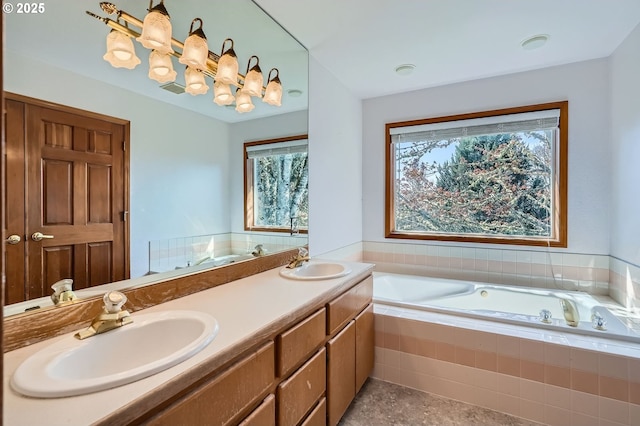 1207 NE 2nd Cir, Battle Ground, WA 98604 - bathroom with double vanity, a garden tub, and a sink