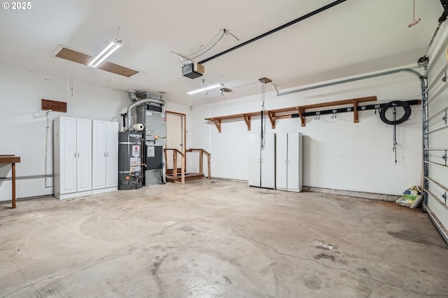 1207 NE 2nd Cir, Battle Ground, WA 98604 - garage with strapped water heater and a garage door opener