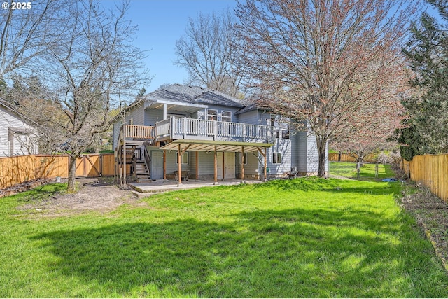1207 NE 2nd Cir, Battle Ground, WA 98604 - back of house featuring a lawn, a fenced backyard, a wooden deck, and stairs