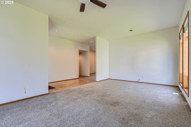 1207 NE 2nd Cir, Battle Ground, WA 98604 - spare room with carpet floors, baseboards, a ceiling fan, and recessed lighting