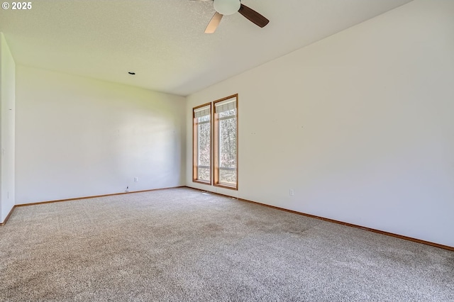 1207 NE 2nd Cir, Battle Ground, WA 98604 - carpeted spare room featuring ceiling fan, baseboards, and a textured ceiling