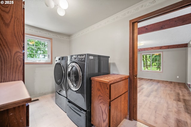 5807 NE 152nd Ave, Vancouver, WA 98682 - laundry area with washing machine and clothes dryer, plenty of natural light, and light floors