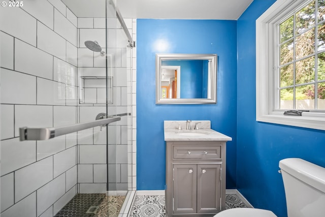 5807 NE 152nd Ave, Vancouver, WA 98682 - full bathroom with a shower stall, vanity, and tile patterned floors