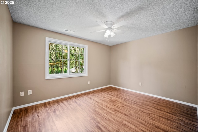 5807 NE 152nd Ave, Vancouver, WA 98682 - unfurnished room featuring wood finished floors, ceiling fan, and a textured ceiling