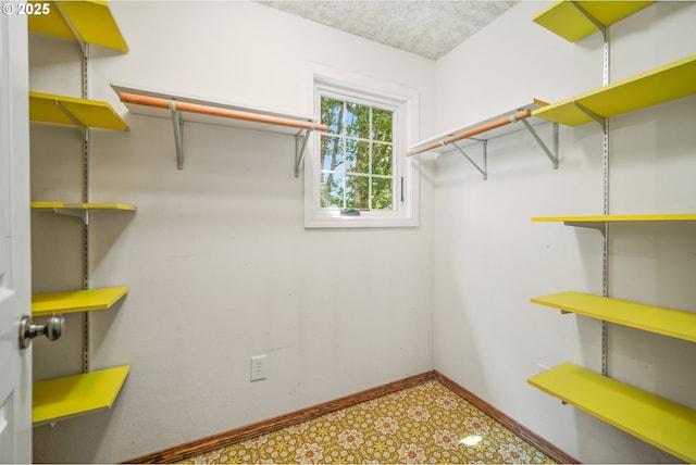 5807 NE 152nd Ave, Vancouver, WA 98682 - walk in closet featuring tile patterned floors