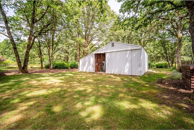 5807 NE 152nd Ave, Vancouver, WA 98682 - view of green lawn with a pole building, an outbuilding, and a garage
