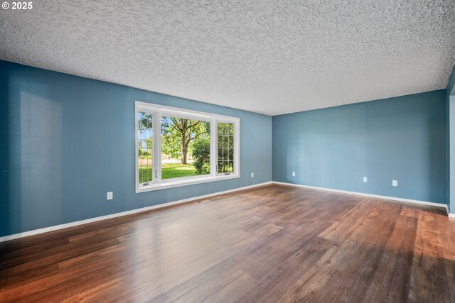 5807 NE 152nd Ave, Vancouver, WA 98682 - spare room with wood finished floors and baseboards