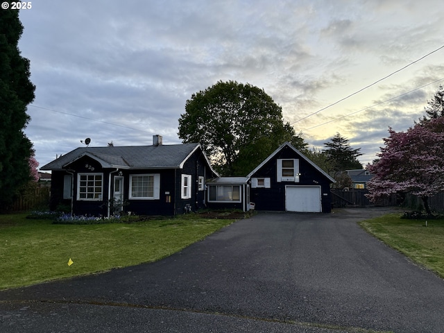 829 NE 107th Ave, Portland, OR 97220 - view of front facade featuring driveway and a garage