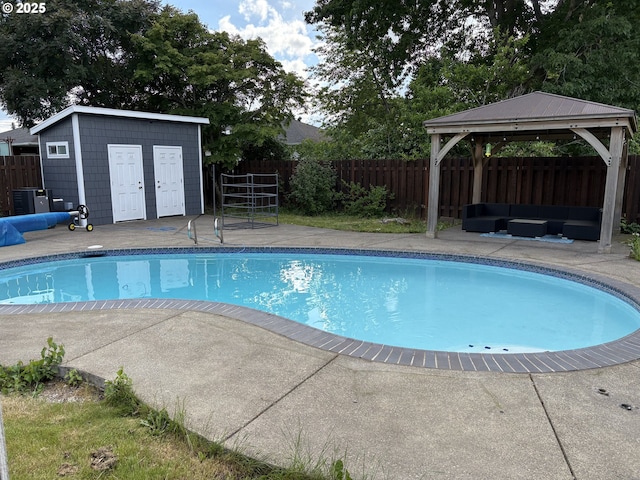829 NE 107th Ave, Portland, OR 97220 - view of pool with a gazebo, a patio, a fenced backyard, an outdoor hangout area, and an outdoor structure