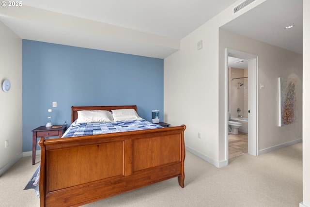 841 S Gaines St Unit 714, Portland, OR 97239 - bedroom featuring light carpet and ensuite bathroom