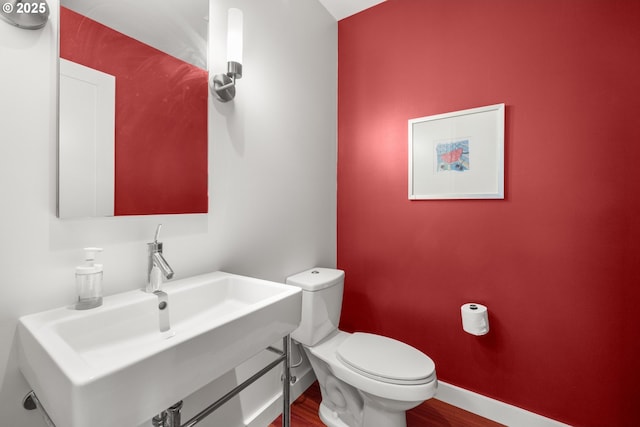 841 S Gaines St Unit 714, Portland, OR 97239 - bathroom featuring a sink and wood finished floors
