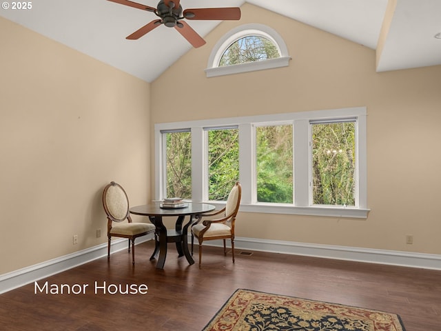 dining area with wood finished floors, baseboards, and ceiling fan