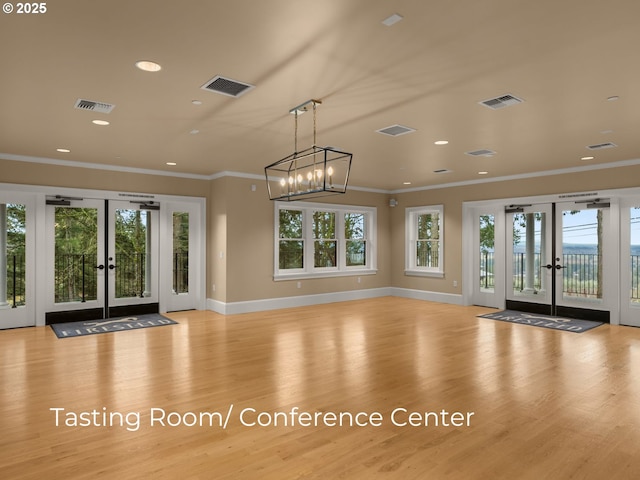 interior space featuring french doors and visible vents