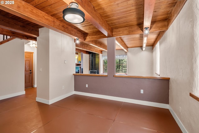 827 Tyler Creek Rd, Ashland, OR 97520 - empty room with a wood ceiling with exposed beams and finished concrete floors