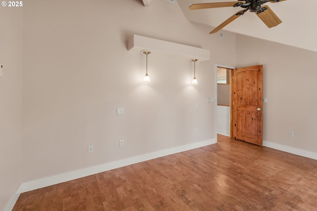 827 Tyler Creek Rd, Ashland, OR 97520 - spare room with a ceiling fan, vaulted ceiling, and wood finished floors